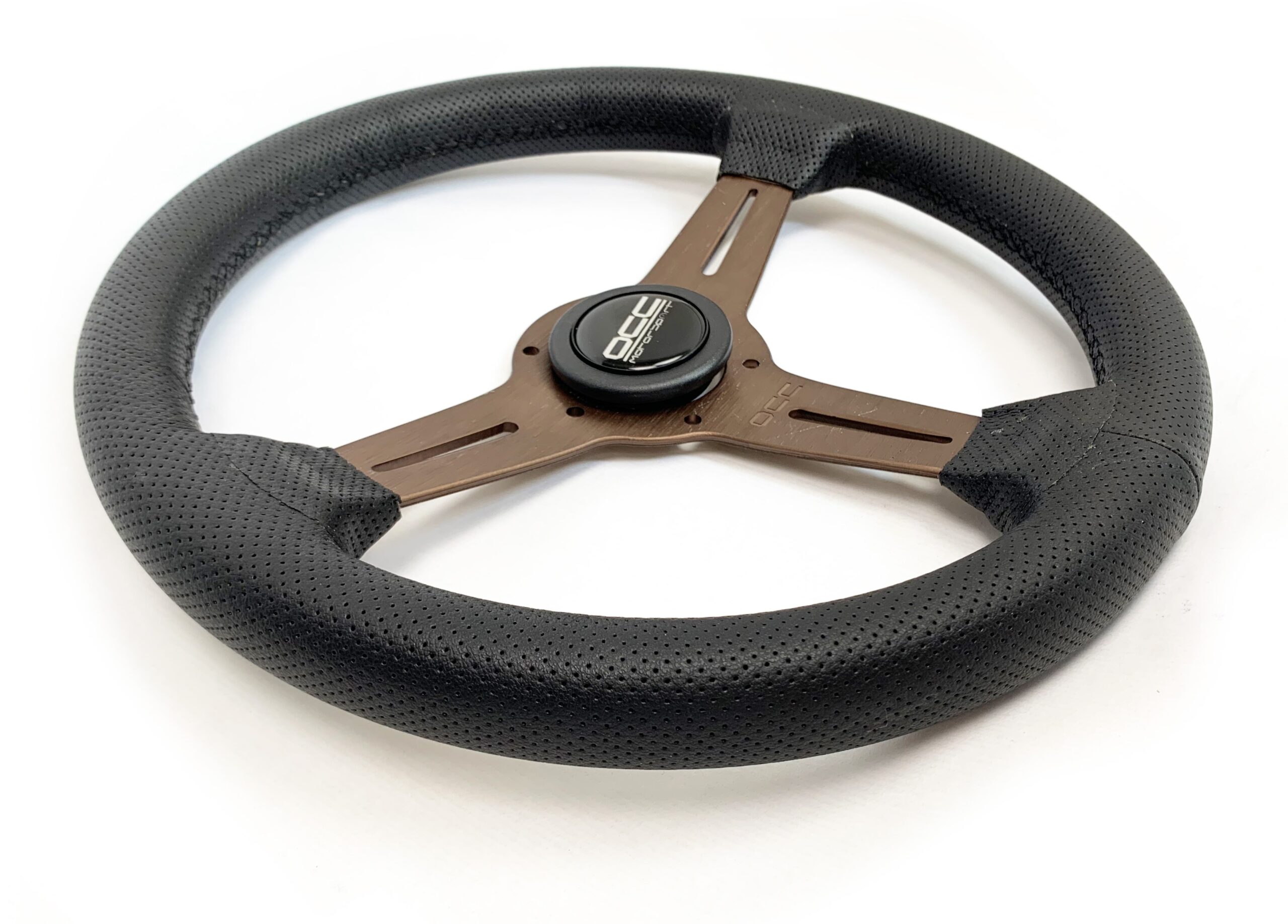 VOLANTE PLANO MOD. CLASSIC PIEL PERFORADA BRAZOS BRONCE OCC MOTORSPORT - Imagen 2